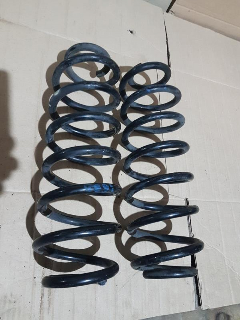 Пружина зад лев Volkswagen Passat B7 2.5 1.8 USA 2011-2015 1K0511115BG